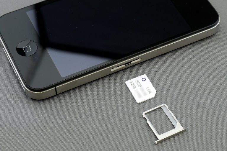 SIM Plans A smartphone with a SIM card tray and a small SIM card beside it.
